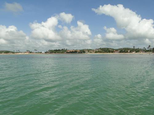 a view of a body of water with a beach at Hotel Pousada Arco Iris in Barra de Santo Antônio