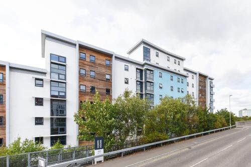 an apartment building on the side of a road at For Students Only Corfe House in Poole in Poole