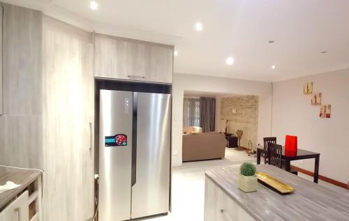 Η κουζίνα ή μικρή κουζίνα στο GUEST HOUSE In MIDRAND