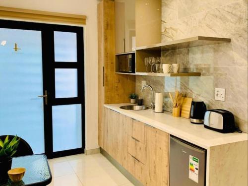 Dapur atau dapur kecil di Essence Lifestyle Premium