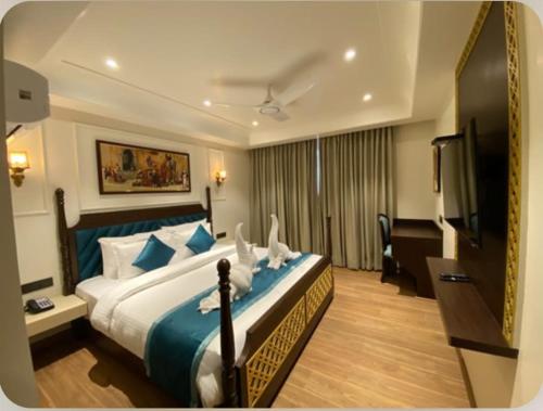 Ένα ή περισσότερα κρεβάτια σε δωμάτιο στο Heena Heritage Resort