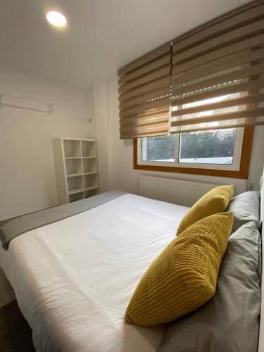 Ένα ή περισσότερα κρεβάτια σε δωμάτιο στο Amplio apartamento cerca de la playa 6