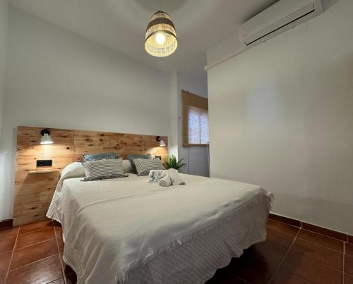 Postel nebo postele na pokoji v ubytování Apartamentos Alma de Zahara