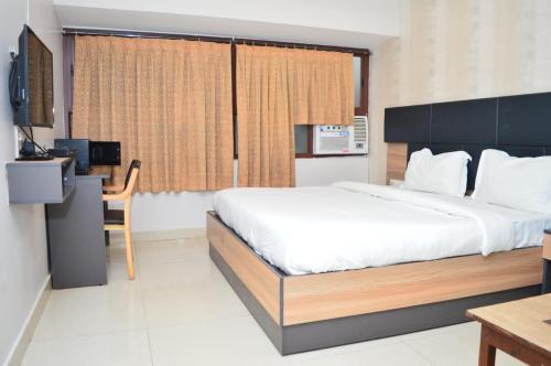 Katil atau katil-katil dalam bilik di Hotel Allnear