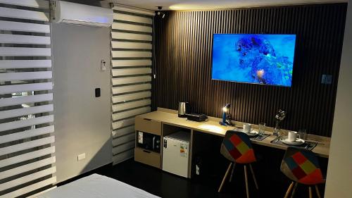 TV a/nebo společenská místnost v ubytování Portugal Suites