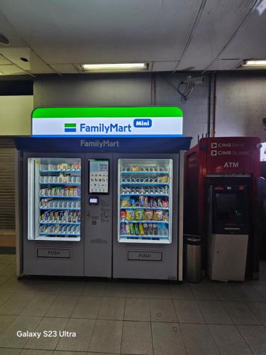 a family mart vending machine in a building at NEW Bangsar Trade Centre KL Mid Valley LRT Bangsar in Kuala Lumpur
