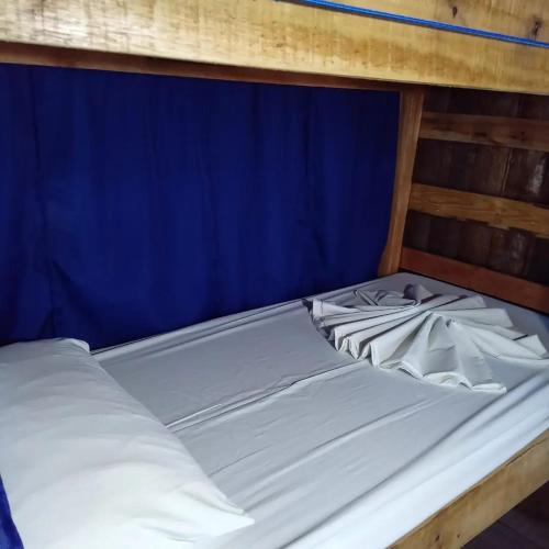 Ένα ή περισσότερα κρεβάτια σε δωμάτιο στο 4 Beach Hostel acomodaçao para10 pessoas
