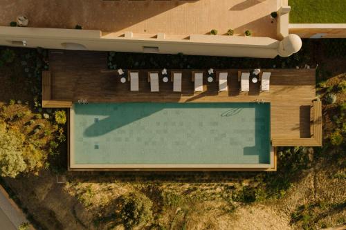an overhead view of a swimming pool in a house at Viceroy Residences at Ombria Algarve in Loulé