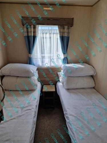Voodi või voodid majutusasutuse caravan 588 Hillside 19 toas
