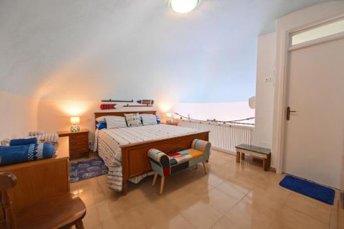 Postel nebo postele na pokoji v ubytování Beach House Ischia