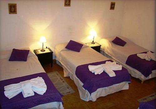 
Una cama o camas en una habitación de Hotel Pueblo Antiguo
