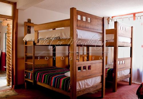 Krevet ili kreveti na sprat u jedinici u okviru objekta Hostal San Fransiskuni
