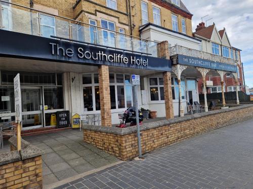 a building with a sign that reads the southern little hotel at Southcliffe hotel in Bridlington