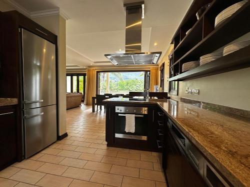 Una cocina o cocineta en Spas Villas Eden Island