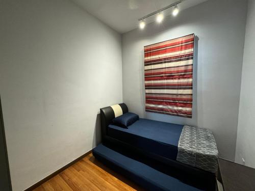 Renai Bukit Jelutong Homeにあるベッド
