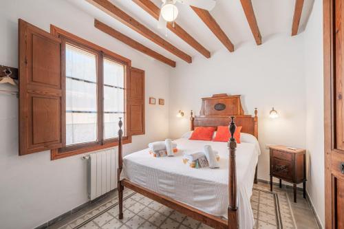 Una cama o camas en una habitación de Can Bac Sóller