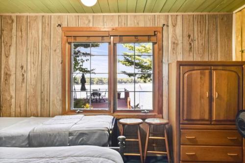 Ένα ή περισσότερα κρεβάτια σε δωμάτιο στο The Guest Cabin Holiday Home