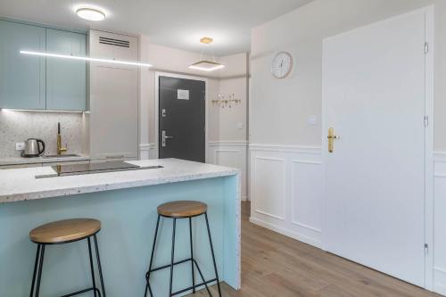 Η κουζίνα ή μικρή κουζίνα στο Nowoczesny apartament z balkonem i widokiem na miasto