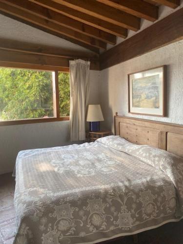 Ένα ή περισσότερα κρεβάτια σε δωμάτιο στο Casa Vallesana, en el Coporito
