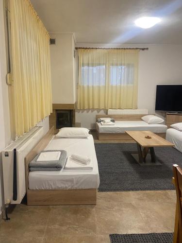 Katil atau katil-katil dalam bilik di Kalfas Apartment 2