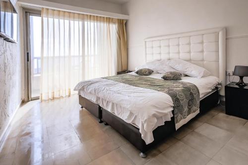 Postel nebo postele na pokoji v ubytování Hotel Blue Weiss