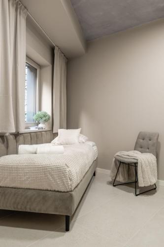 Una cama o camas en una habitación de Zawidoki
