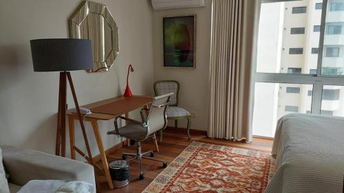 TV a/nebo společenská místnost v ubytování Elegante duplex Vila Nova Conceicao, Brooklin e regiao