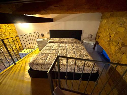 a bedroom with a bed in a room at Casa Leo in Capoliveri