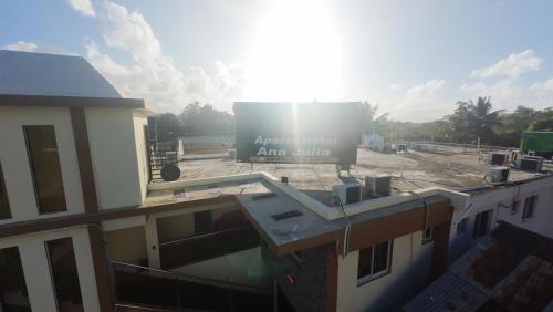 a large sign on the side of a building at Aparta Hotel Ana Julia in Sosúa