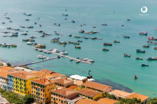 an aerial view of a harbor with boats in the water at Luna Sol Villas - Dedicated Care Until Check Out in Phu Quoc