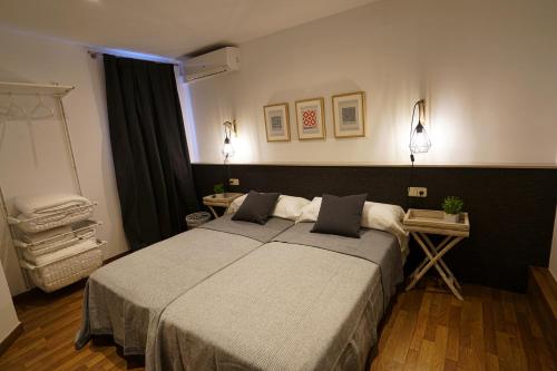 Posteľ alebo postele v izbe v ubytovaní 555 Apartments BCN