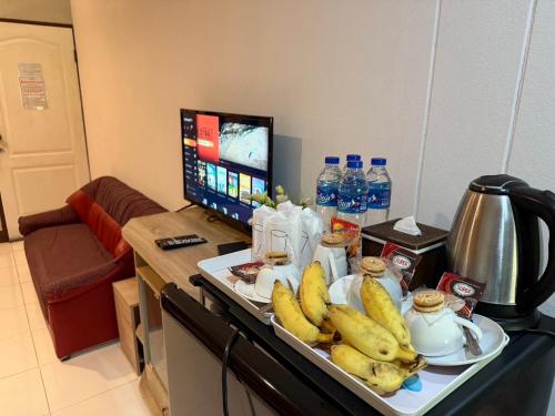 TV a/nebo společenská místnost v ubytování Sandee Place Mountain View Hotel โรงแรมแสนดีเพลส เมาเท่นวิว จอมทอง