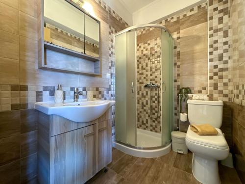 Ένα μπάνιο στο Naselia Apartments