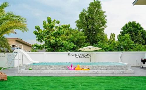 Κήπος έξω από το Green Beach Pool Villa