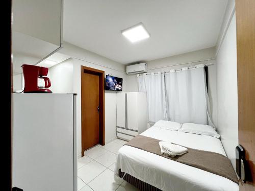 Postel nebo postele na pokoji v ubytování Residencial Carajás