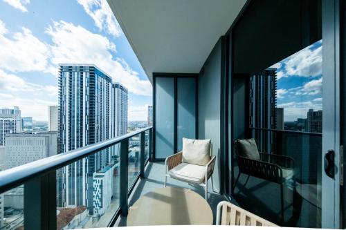 a balcony with a chair and a view of the city at NEW Suite Downtown Miami - Amazing view 27th floor in Miami