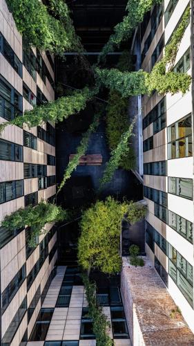 a building with plants on the side of it at Anselmo Buenos Aires, Curio Collection by Hilton in Buenos Aires