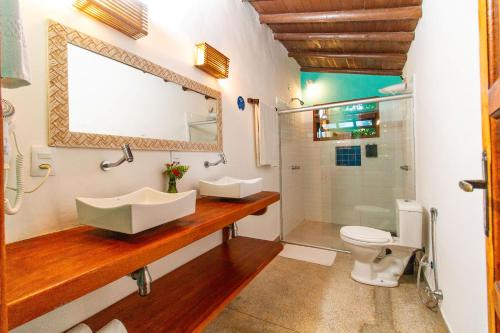 Ένα μπάνιο στο Travel Inn Pousadas & Beach Club Trancoso