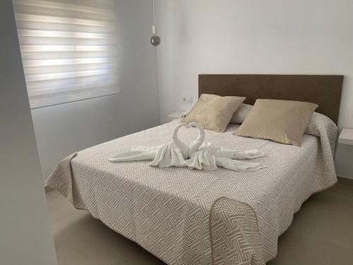 Ένα ή περισσότερα κρεβάτια σε δωμάτιο στο Casa Luzdimar 3
