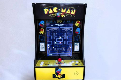 a game machine with a paw man puzzle on it at Aspen Haven - Mountain Retreat BBQ Scenic Views in Divide