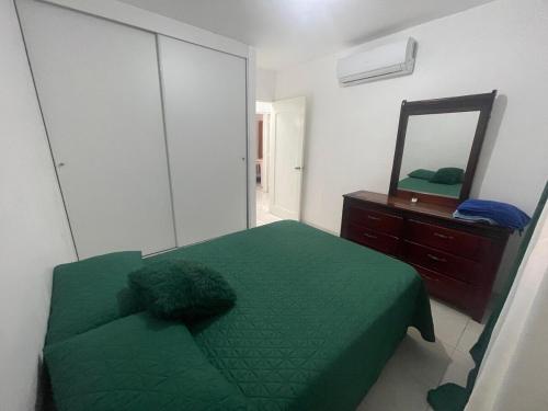 Krevet ili kreveti u jedinici u okviru objekta Apartamento en Edificio Palmares