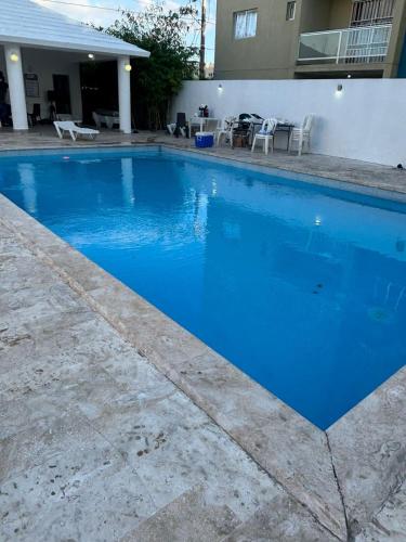 Piscina a Apartamento en Edificio Palmares o a prop