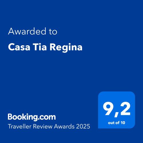 a screenshot of a cell phone with the text awarded to casa tika regimen at Casa Tia Regina in Hervás