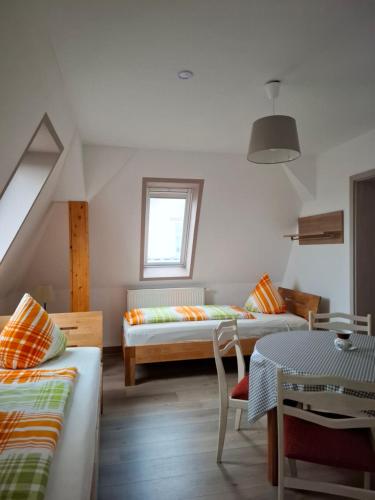 Postel nebo postele na pokoji v ubytování Gästehaus Wagner