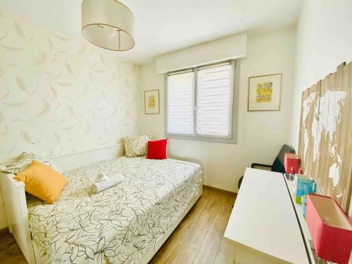 Postel nebo postele na pokoji v ubytování Appartement YELLOW proche de la gare de Perpignan