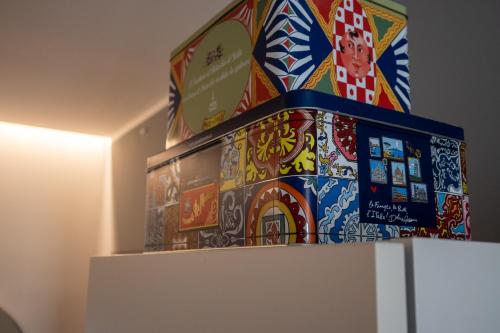 a stack of boxes on top of a refrigerator at Milanese LODGE/Luxury House in the heart of Milan in Milan