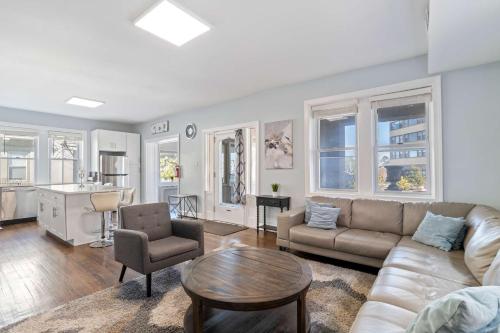 a living room with a couch and a table at 4BR 2BA Luxe Beach Estate II in Atlantic City