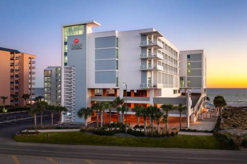 a rendering of a hotel near the ocean at Best Western Premier - The Tides in Orange Beach