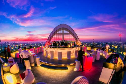 a view from the top of a building with a bar at Centara Grand At CentralWorld in Bangkok