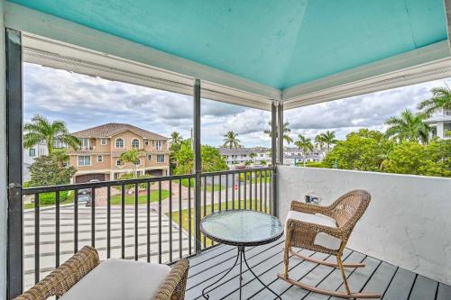 a balcony with a table and chairs and a view at Waterfront Marco Island House with Shared Dock! in Marco Island